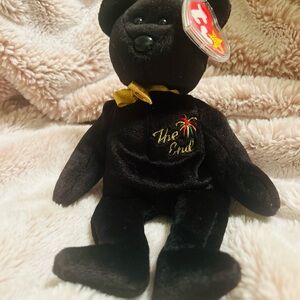 Ty Black Bear Stuffed Animal with Gold Bow